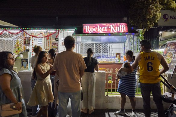 Customers outside Rocket Kulfi.