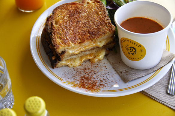 Old Bay grilled cheese with a cup of tomato soup.