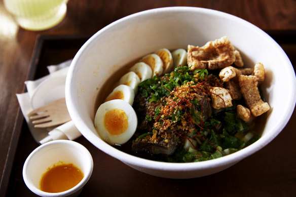 Go-to dish: Kinalas beef noodle soup with hard-boiled egg and pork crackling.