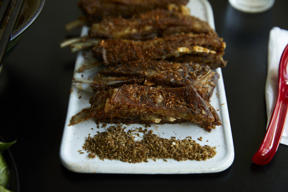 Lamb ribs are a tumble of fat, flesh and rustling skin.
