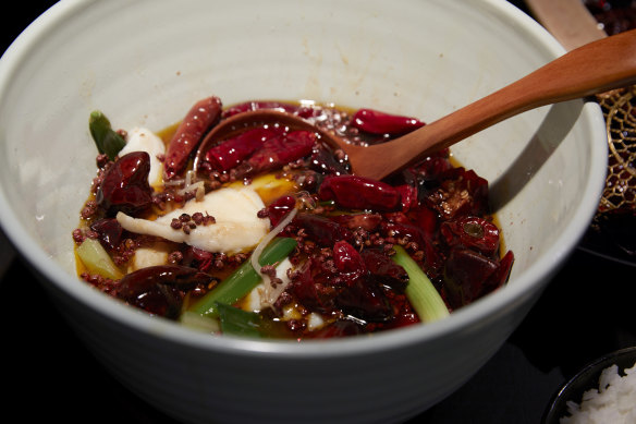 Fish drowned in “heaven facing” chilli oil.
