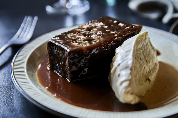 Sticky-date cake with pecan praline and creme fraiche.