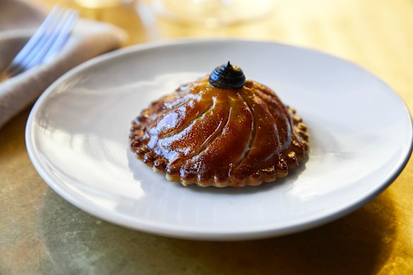 The bar menu’s Maremma duck pithivier served with black garlic.