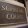 Council staffer intimidated by people shouting conspiracy theories, court hears