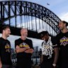 Matthew Dellavedova, Brian Goorjian, Kendric Davis and Xavier Cooks after the Sydney Kings won the NBL title.