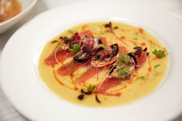 Tiradito de trucha (cured trout with escabeche mussels, pickled chalaca and amarillo leche de tigre).