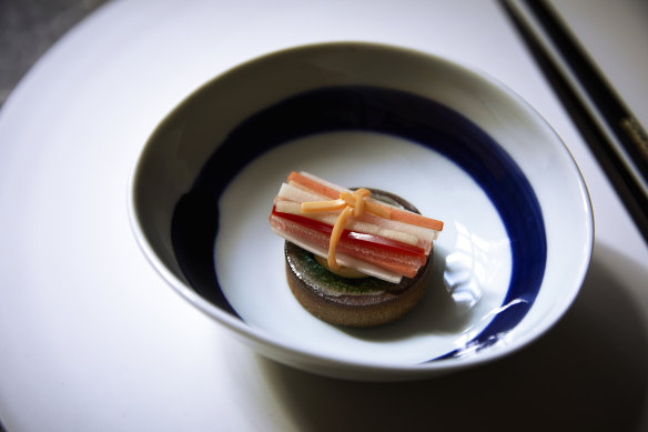 Naeng-chae - assorted vegetables with egg yolk knot and mustard sauce.