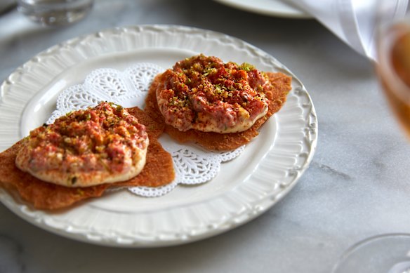 Wagyu tartare and macadamia cream on pane carasau.