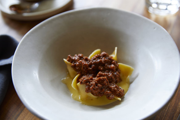 Ricotta and smoked mozzarella cappelletti with bolognese.