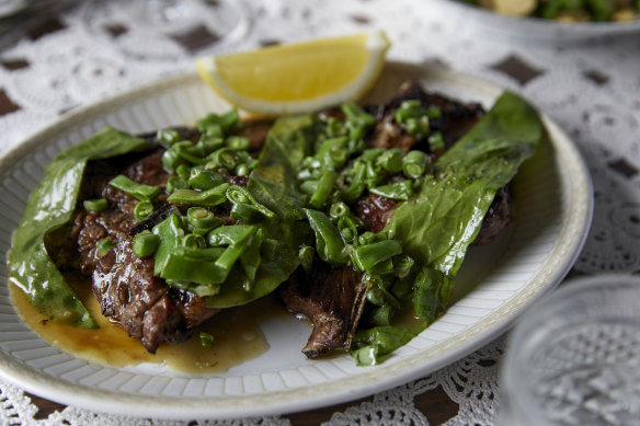 Lamb chop with whey reduction, sorrel and green beans.
