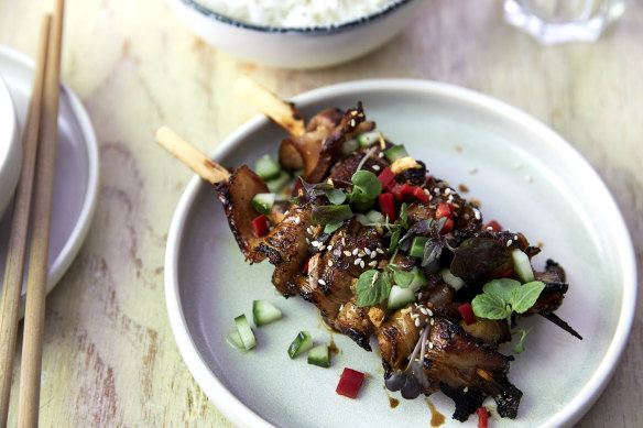 Glazed pork belly skewers.