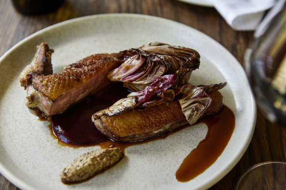 Dry-aged duck with blood plum sauce, mustard and radicchio.