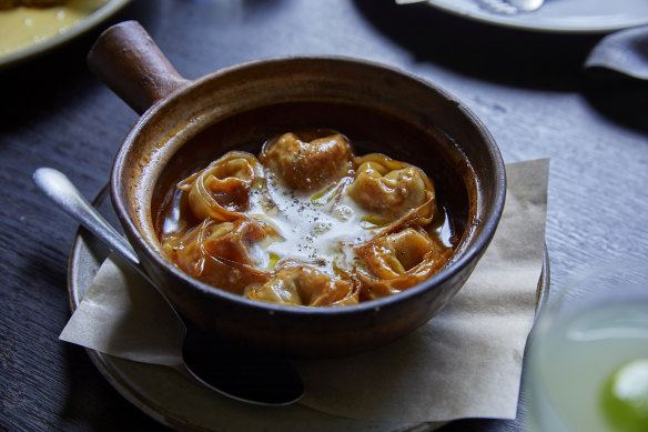 Go-to dish: Braised duck dumplings with smoky broth.