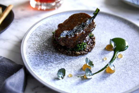 Beef cheek with blue lentils and Tuscan cabbage.