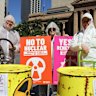 Campaigners outside City Hall in the electorate of Brisbane. 