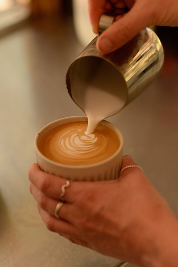Coffee is served in compostable cups.