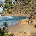The secluded cove of Little Bay Beach in Arakoon National Park.