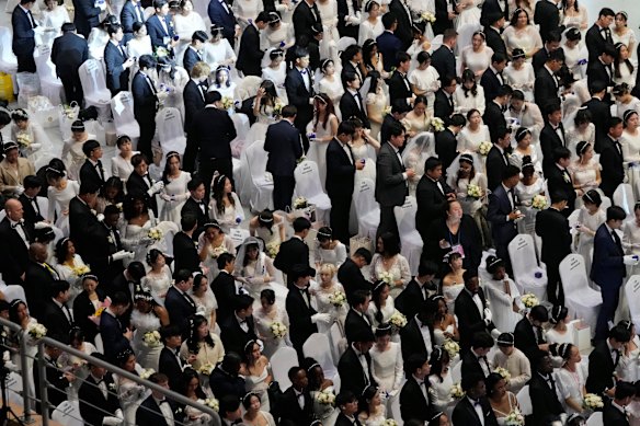 Couples attend a mass wedding ceremony at the Cheong Shim Peace World Center in Gapyeong, South Korea.