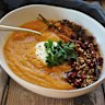 Sweet potato and carrot soup with toasted seeds and pomegranate.