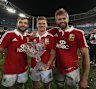 Alex Corbisiero (L), Owen Farrell and Geoff Parling hold the Tom Richards Cup in 2013.