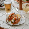 Hotel Sorrento’s new rooftop bar serves lobster brioche rolls with ocean views.