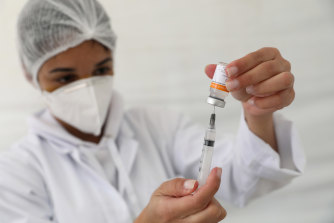 A health worker prepares a CoronaVac vaccine against COVID-19 during an immunisation campaign for people at UBS Colombo Basic Health Unit on June 18, 2021 in Sao Paulo.