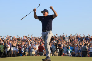 Phil Mickelson celebrates his record-breaking PGA Championship victory.