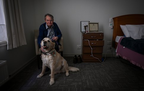 John Aucote with his dog Susie.
