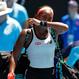 Coco Gauff leaves the court after her loss.