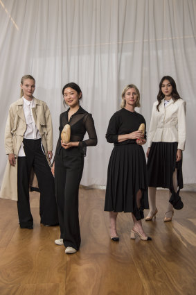 Helena Dong (second left) and Amanda Nichols (second right) with models wearing their winning designs at the Australian Fashion Foundation awards on Tuesday.