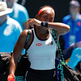 Coco Gauff leaves the court after her loss.