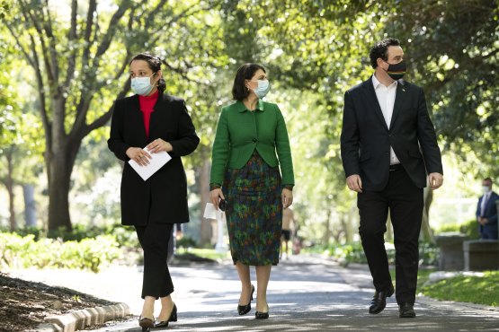 NSW Premier Gladys Berejiklian, Tourism Minister Stuart Ayres and Deputy Chief Health Officer Dr Marianne Gale in Sydney on Friday.