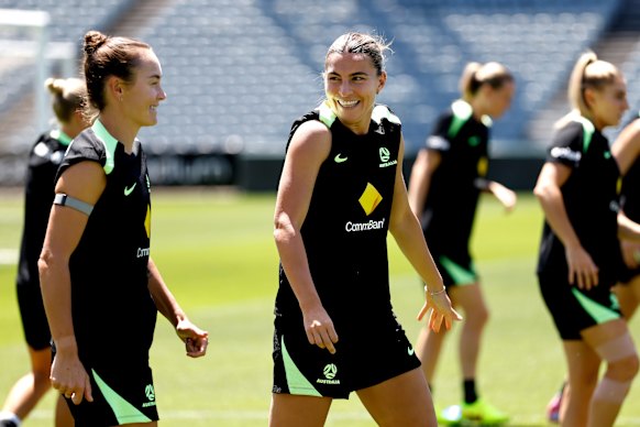Arsenal pair Caitlin Foord and Steph Catley were in high spirits despite the heat.