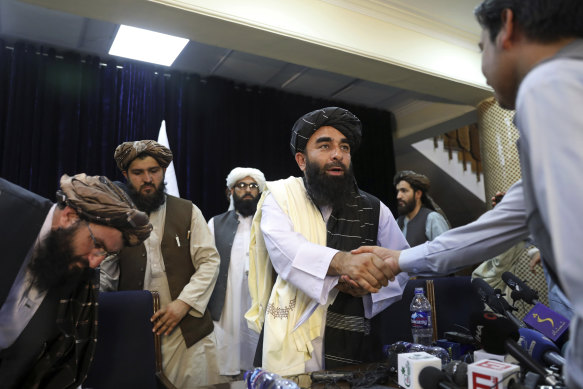 The Taliban have a polished communications team now. Their spokesman Zabihullah Mujahid shook hands with a journalist after his first news conference in Kabul on Tuesday night, 