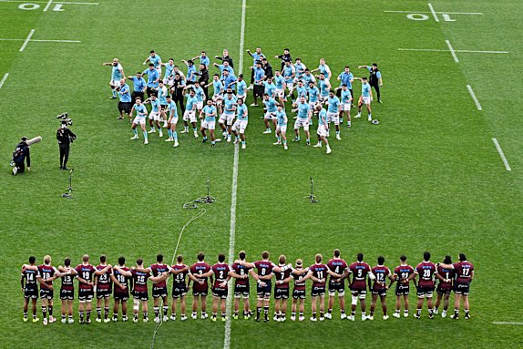 Moana Pasifika performs the Tau Moana before the game.