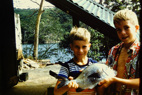 Hugo Massey (left) and John Todd hold up their fish.