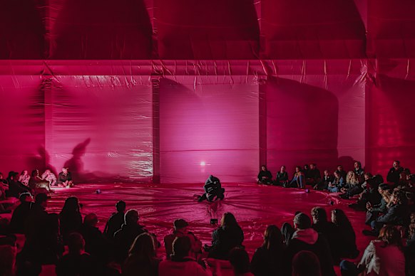 Choreographer Amber McCartney performs in the MATRIA installation.