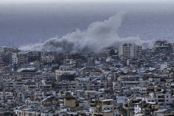 Smoke rises from the site of an Israeli airstrike in Dahiyeh, Beirut, on Tuesday.