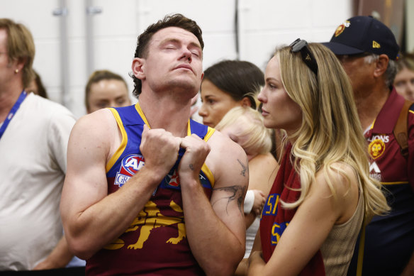 Heartbroken Lions skipper Lachie Neale in the Brisbane Lions rooms after the grand final.