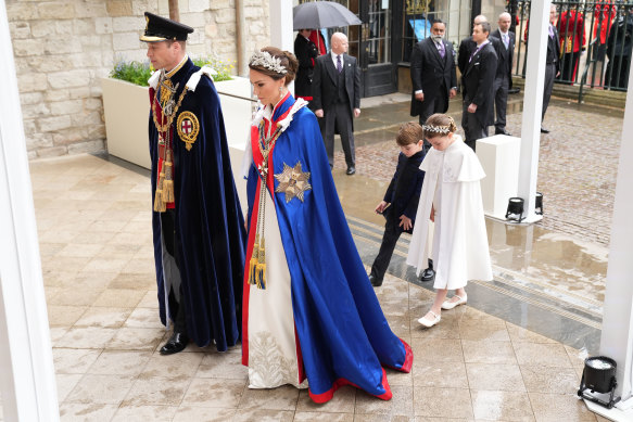 The Prince and Princess of Wales, Prince Louis and Princess Charlotte arrive at the coronation of King Charles III.
