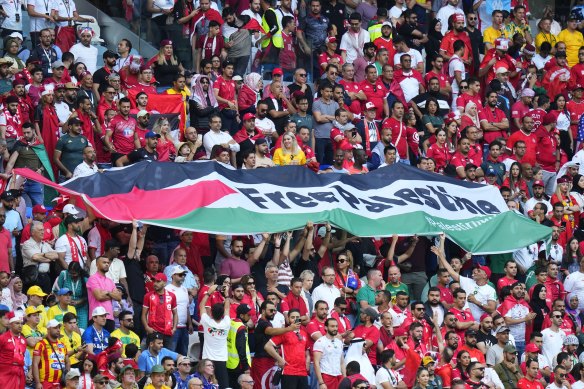 Fans supporting the Palestinian cause at the World Cup in Qatar last year.