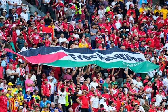 Fans supporting the Palestinian cause at the World Cup in Qatar last year.