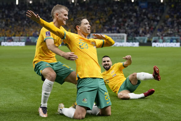 Australia’s Craig Goodwin, centre, celebrates his goal against France.