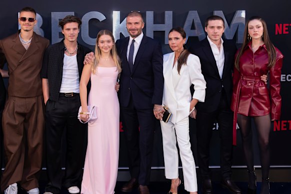 Romeo Beckham, from left, Cruz Beckham, Harper Beckham, David Beckham, Victoria Beckham, Brooklyn Beckham and Nicola Peltz Beckham appear at the premiere of the Netflix docuseries Beckham in London in October, 2023.