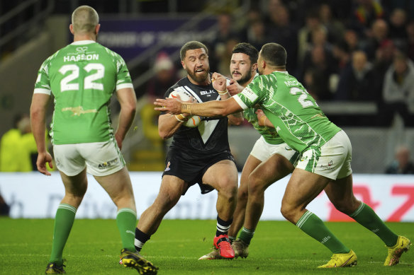 Kenny Bromwich, second from left and playing for New Zealand, is tackled by Irishman Ronan Michael during the Rugby League World Cup in England last October.
