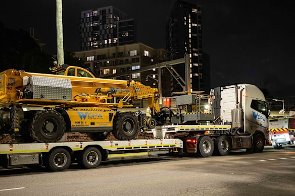 The locomotive that will remove the train arrives at Strathfield.