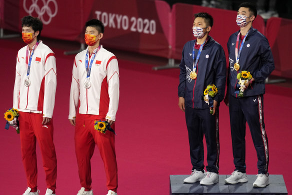 From left, silver medallists Li Jun Hui and Liu Yu Chen of China, and gold medallists Chinese Taipei’s Wang Chi-Lin and Lee Yang on the dias.