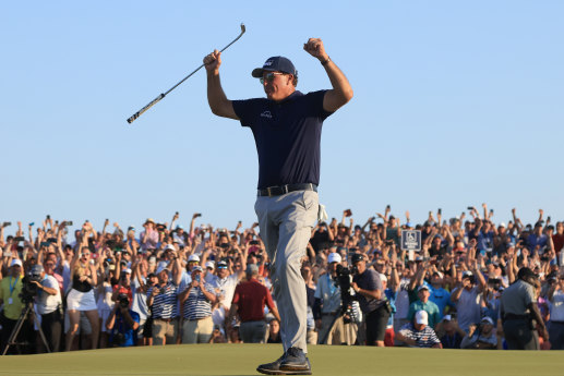 Phil Mickelson celebrates his record-breaking PGA Championship victory.