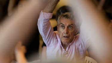Craig Taylor participates in a dance class for people who have Parkinson's disease and their carers in the Utzon Room at the Sydney Opera House