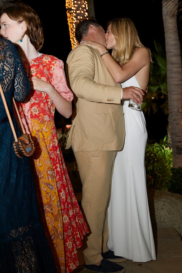 Karl Stefanovic and Jasmine Yarbrough embrace at their pre-wedding cocktail reception in Mexico on Thursday night.